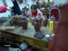 Photographs of Cloisonné vases being made in China