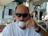 Me (bill lund) in Mykonos Greece sipping some Greek coffee