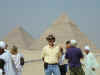 Bill in his funny cowboy hat with the pyramids in the background